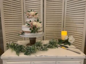 Ring Centerpiece accenting Wedding Cake