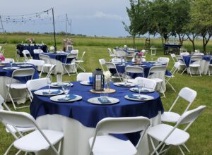 Beautiful Blue Outdoor Wedding with Lights and Linens
